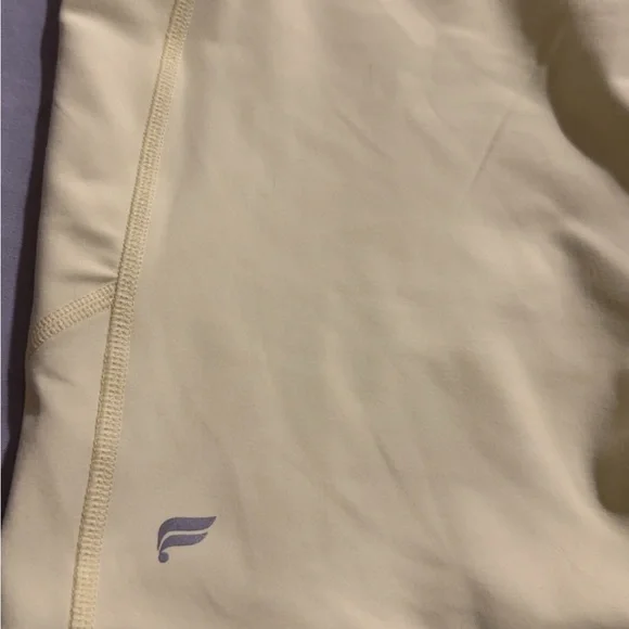 Fabletics Pure Luxe High Waisted Pastel Yellow Bike Shorts 6” - Picture 4 of 6